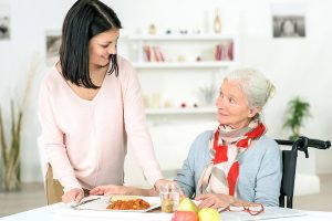 Care worker with elderly woman