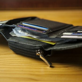 Close up of open wallet sitting on table