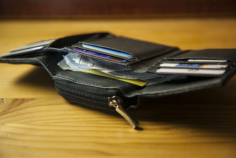 Close up of open wallet sitting on table