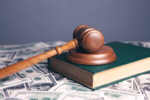 gavel book and money