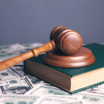 gavel book and money