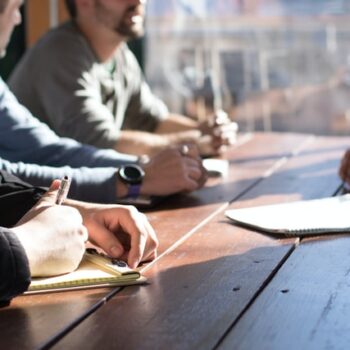 men having a mediation meeting