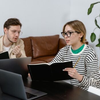 brother and sister discussing estate at home