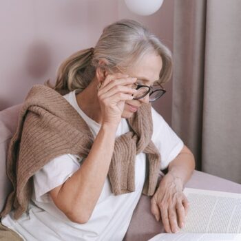 senior woman reading a book