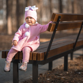 child alone in a park in winter